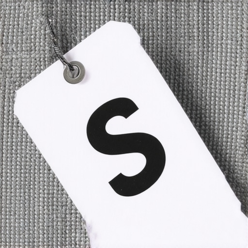 Close up of an S-coded upholstery care tag to avoid water damage